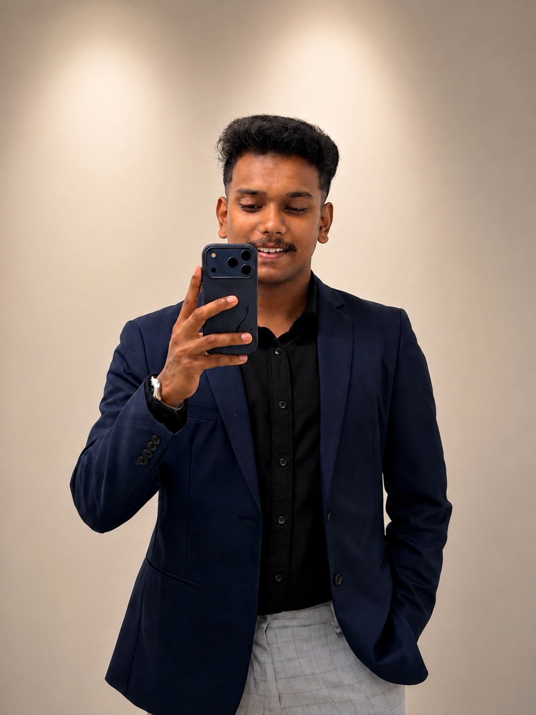 Sonu in a navy suit